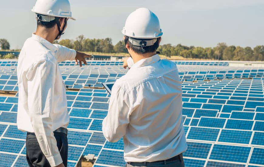 engineers working on PV installations fueling global solar installation growth