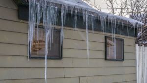 - Solar Royal residential roof with an ice dam