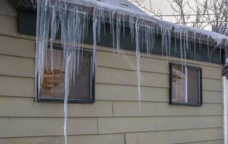 residential roof with an ice dam