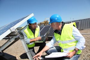 Coal Field Solar Fund engineers install solar arrays